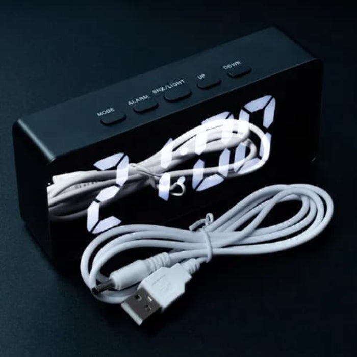 LED Digital Alarm Clock with Mirror Display with its Cable.