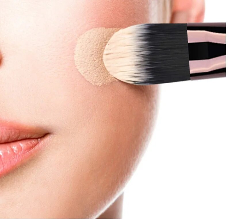 A girl is using the 16-Piece Makeup Brushes Set Kit with Premium Synthetic Bristles and an Eyebrow Razor