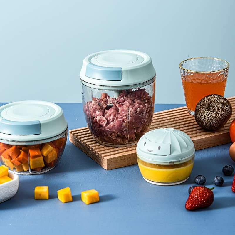 Manual Food Processor with Chopped Food Items.