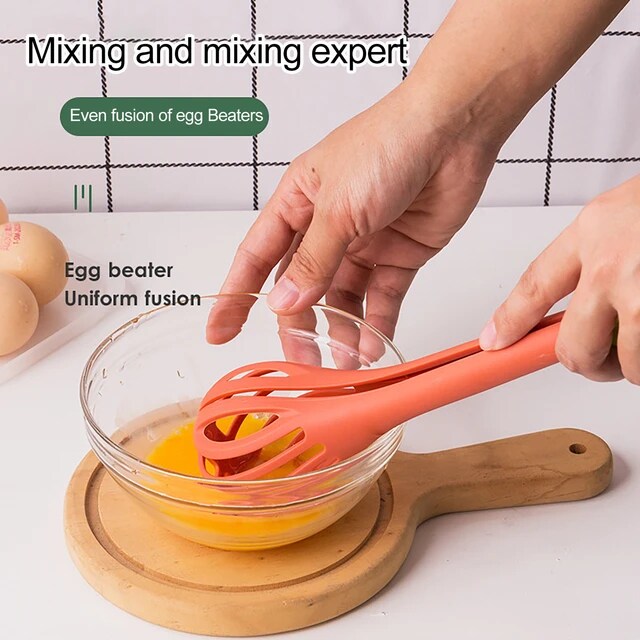 A Person Beats Egg Using Manual Kitchen Whisk.