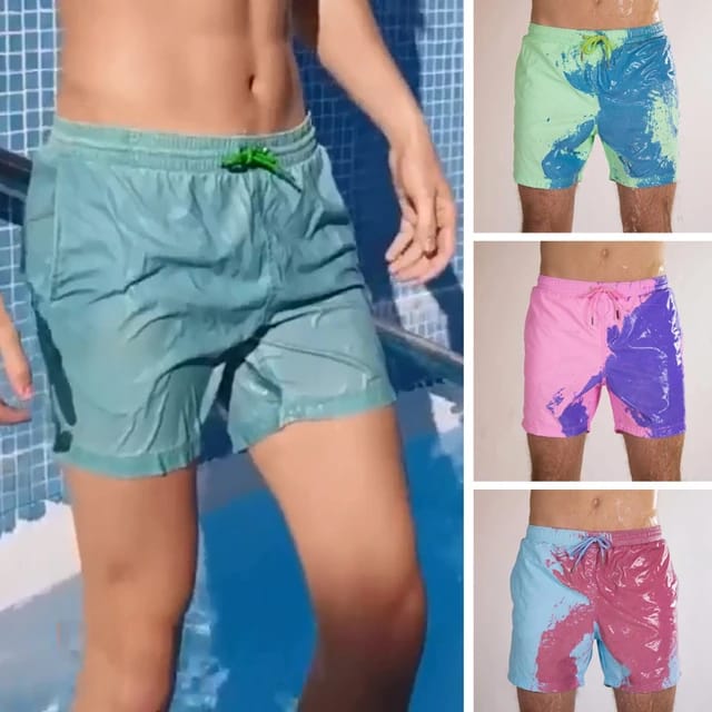 A Person is Wearing Men Color Changing Beach Shorts.