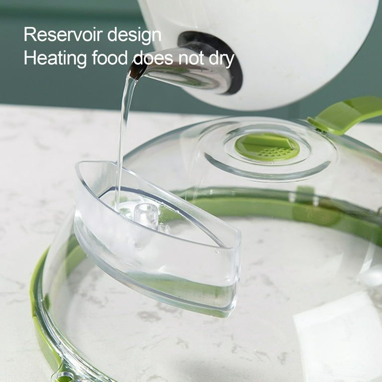 Water is Filling in to the Reservoir of Microwave Oven Splatter Cover.