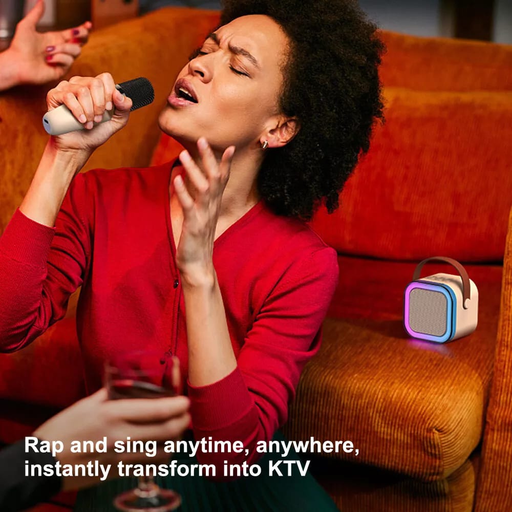 A Singer Sings Using Mini Bluetooth Speaker With Wireless Karaoke Microphone.