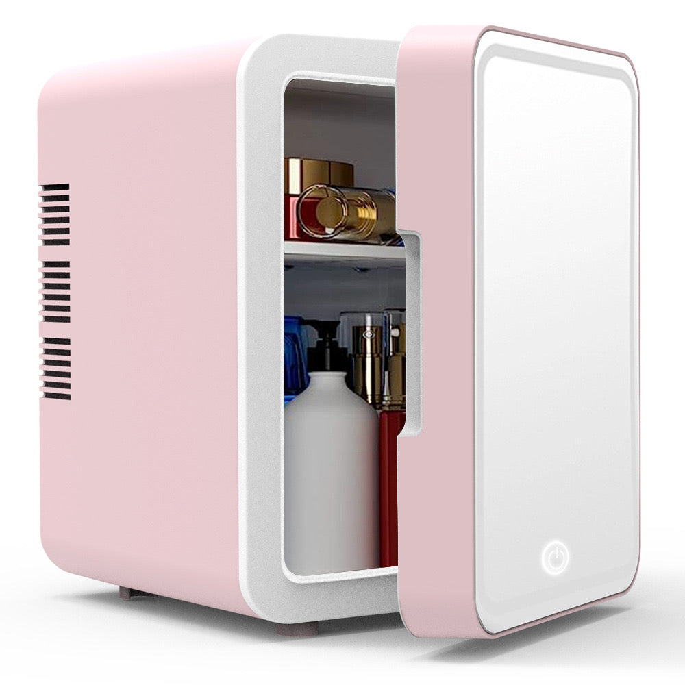 Makeup Items and Cosmetics Are Arranged On the Mini Multifunction Cosmetic Refrigerator With Mirror.