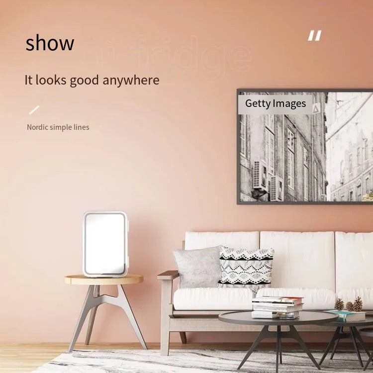 Mini Multifunction Cosmetic Refrigerator With Mirror Placed Beside Sofa Set.