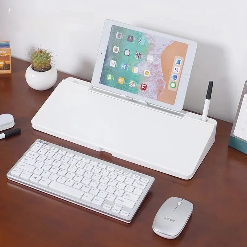 Multifunctional Glass Desktop Box placed on the table next to some items