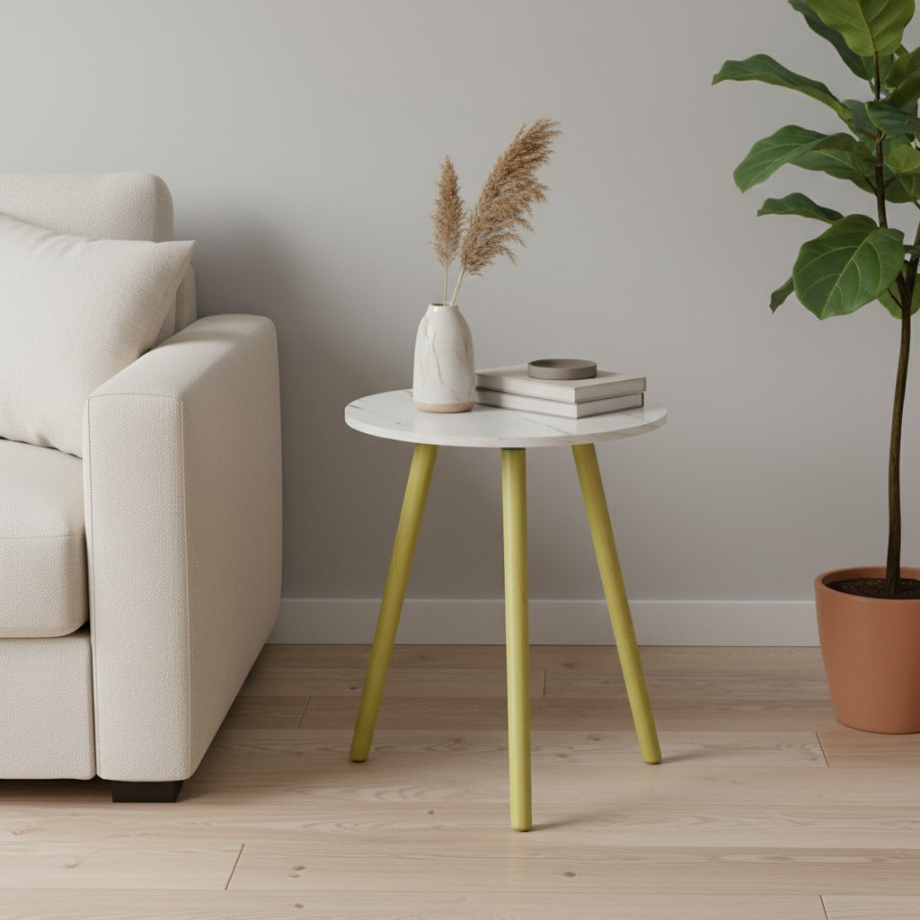 A Modern Round Wooden Side Coffee Table Organized with Some Books are Placed Next to Sofa.