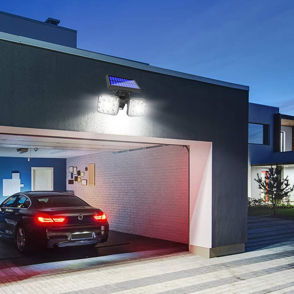 Motion sensor LED solar light placed on the car shed