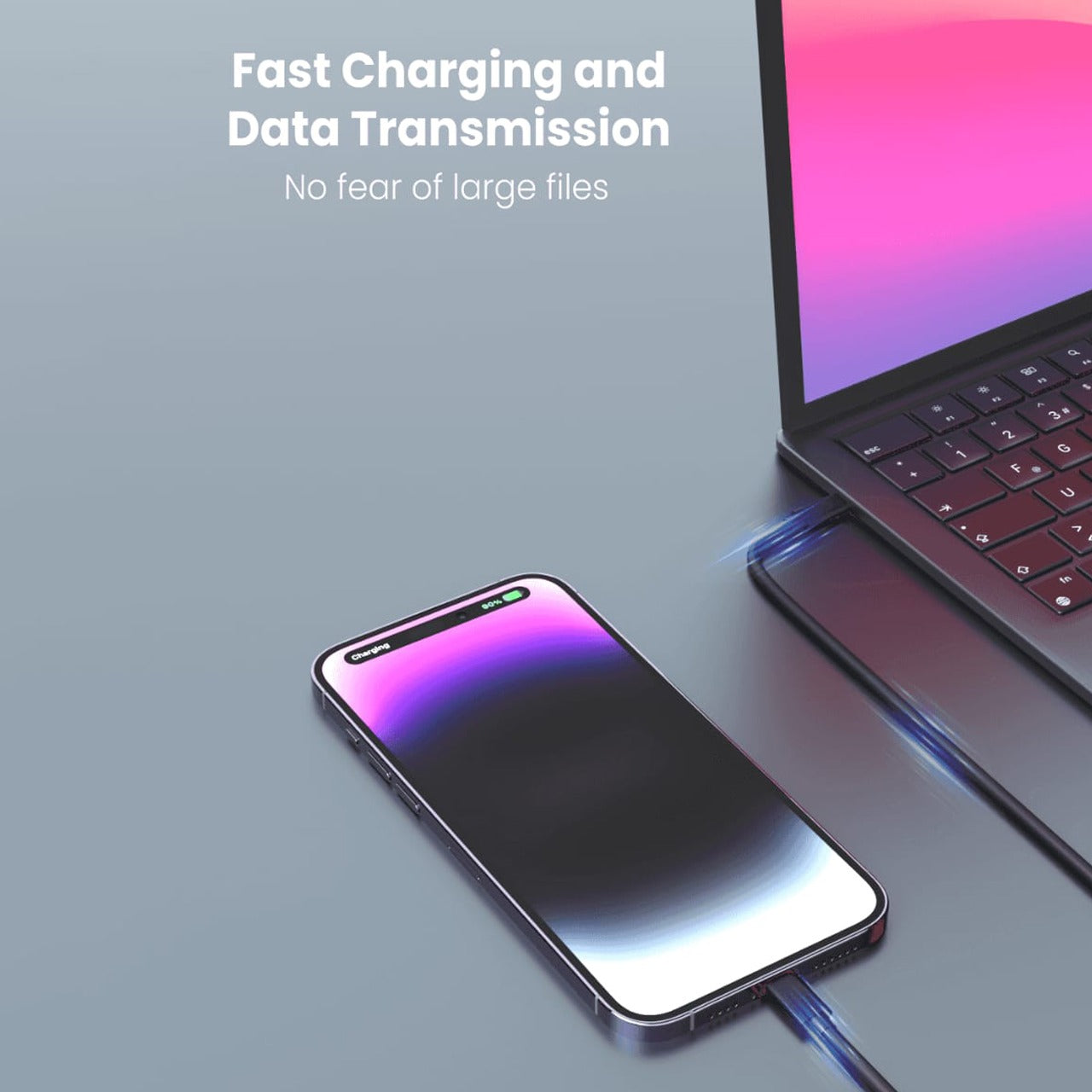 A Phone is Connected to Laptop Using Moxedo Multi-Function Mini Charging Cable Conversion Travel Kit.