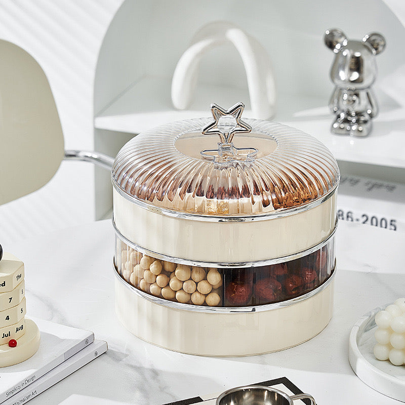 Multi-Layer Snack Storage Container With Lid Having Dried Fruits.