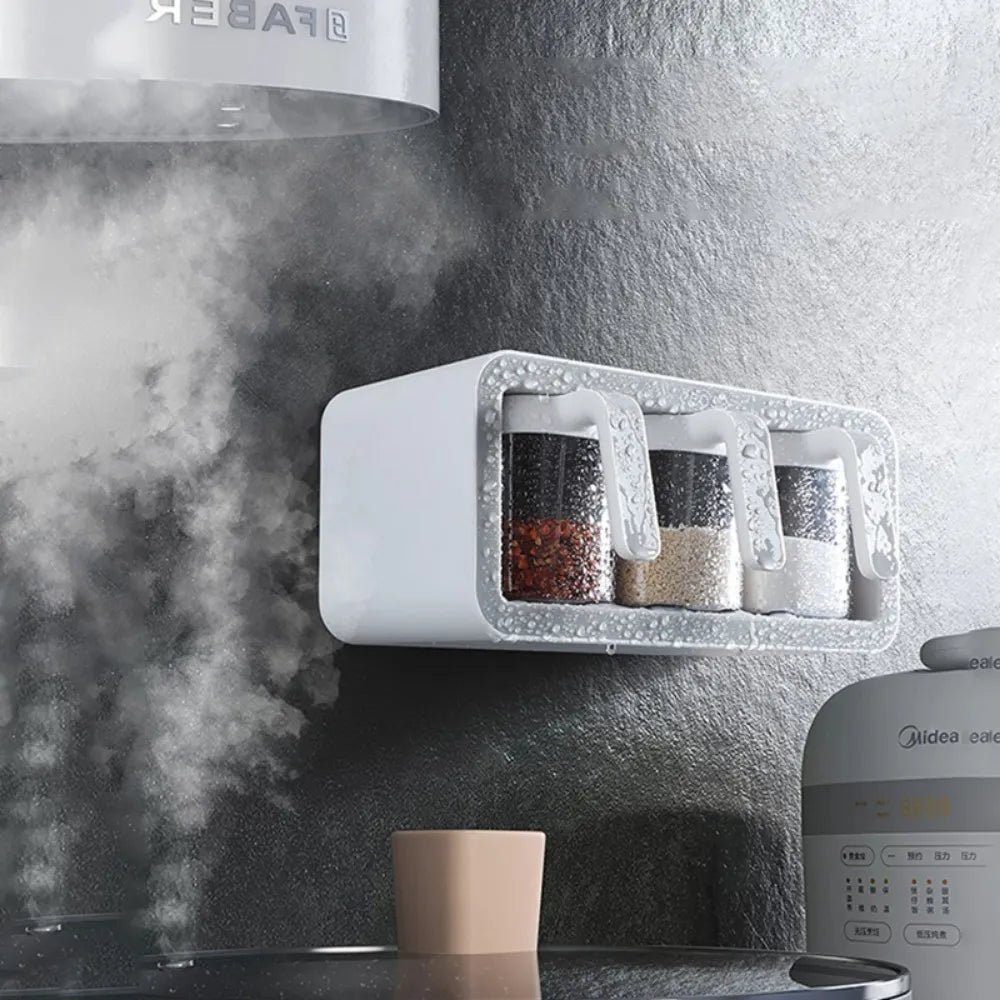 ECOCO 3 Cups Wall Mount Spice Rack Organizer placed on the wall