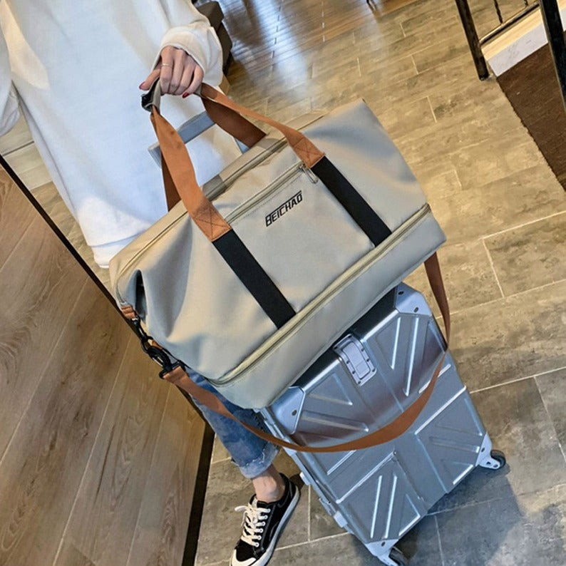 A Girl is Holding Multi-functional Fashion Fitness Travel Duffle Bag.