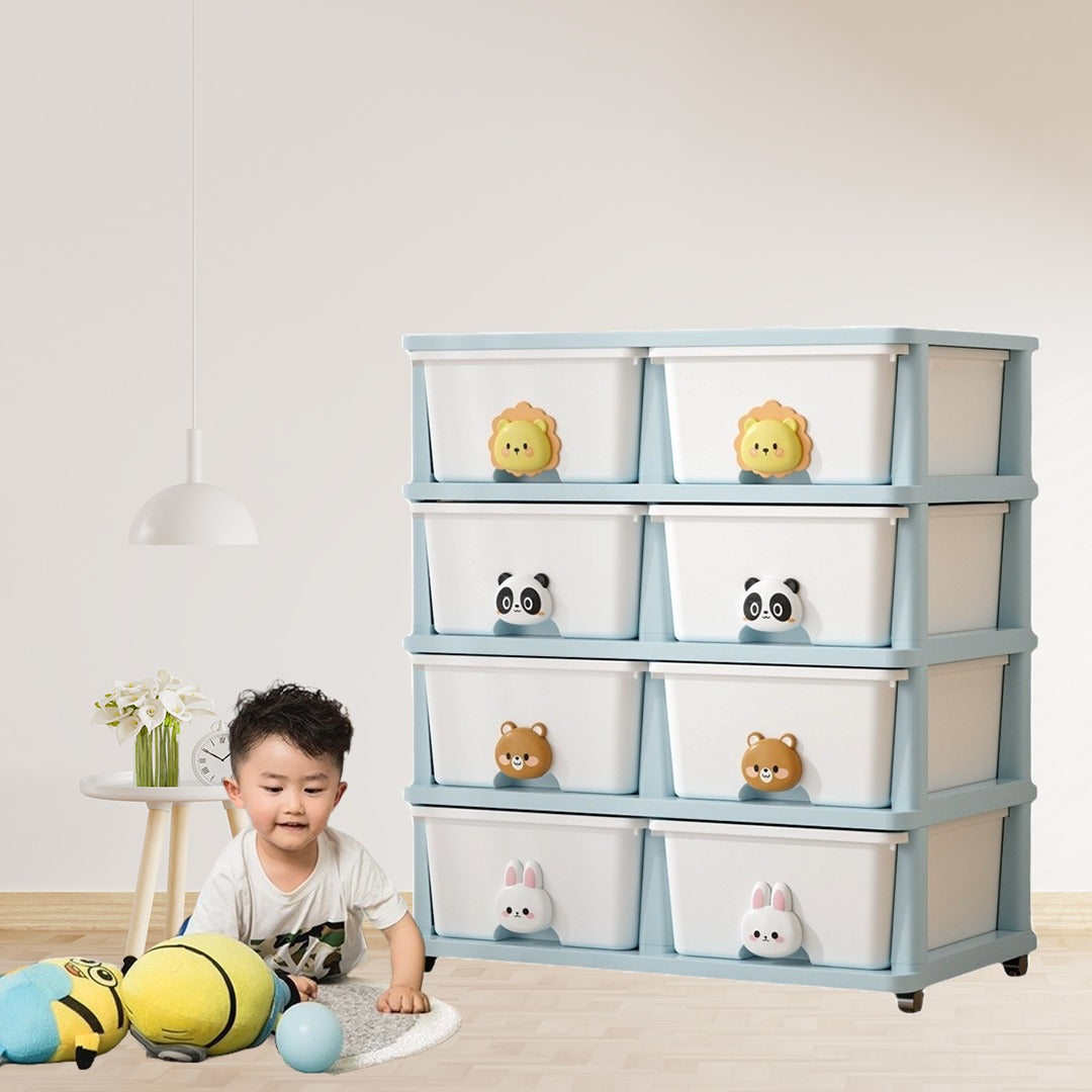 A Boy is Playing Near Multi-layer Drawer Type Storage Cabinet Box.