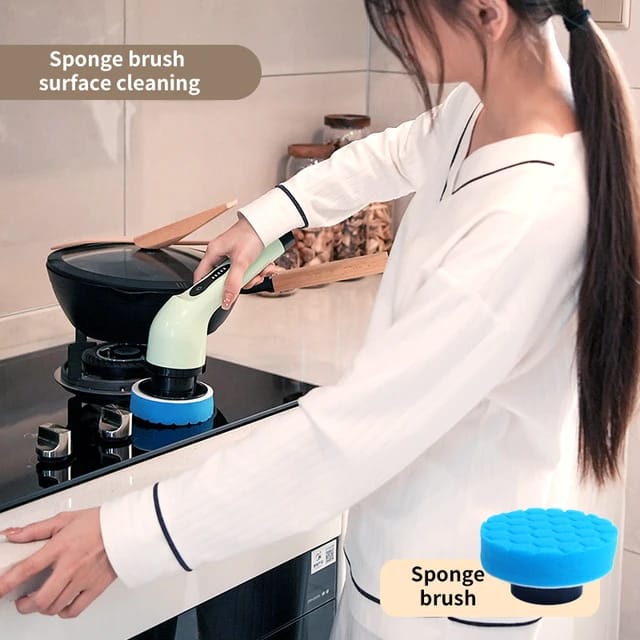 A lady cleaning a stove with the help of the 9-in-1 Multifunctional Electric Cleaning Brush