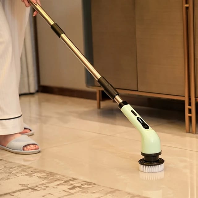 Someone cleaning the floor with the 9-in-1 Multifunctional Electric Cleaning Brush