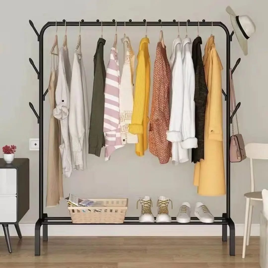 Clothes are Hanged on the Multipurpose Metal Garment Stand.