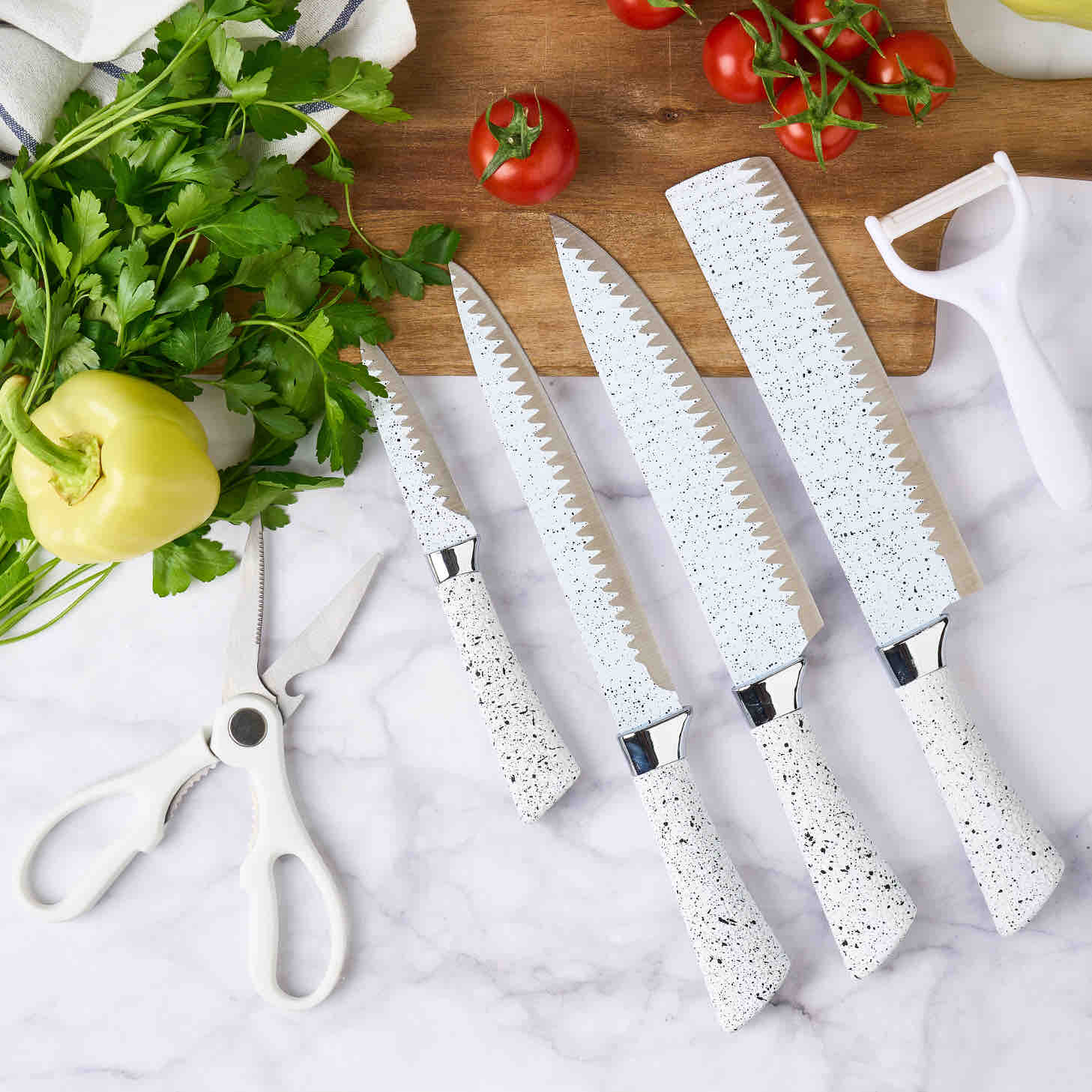 Non-Stick Coated 6 Pcs Knife placed next to some vegetables