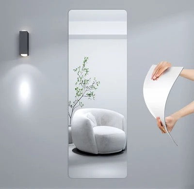 person testing the durability of HD Self-Adhesive Acrylic Mirror Tiles - Soft mirrors