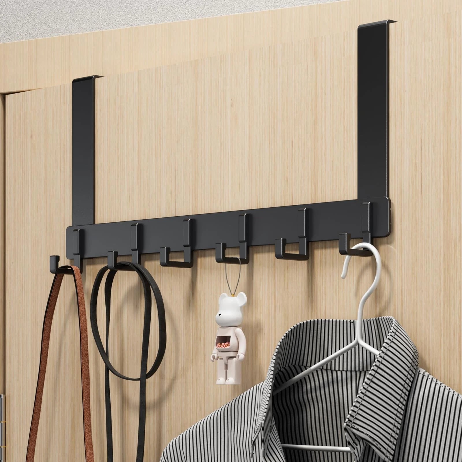Dresses and Other Accessories are Hanged on a Over Door Hooks.