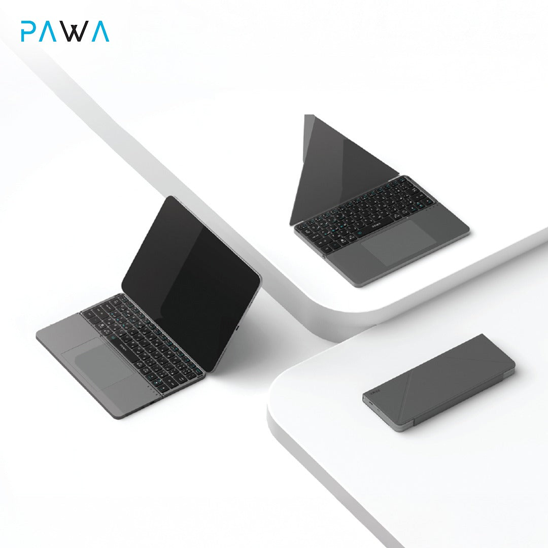 Three laptop computers with PAWA Foldable Wireless Bluetooth Keyboard in different orientations on a white background