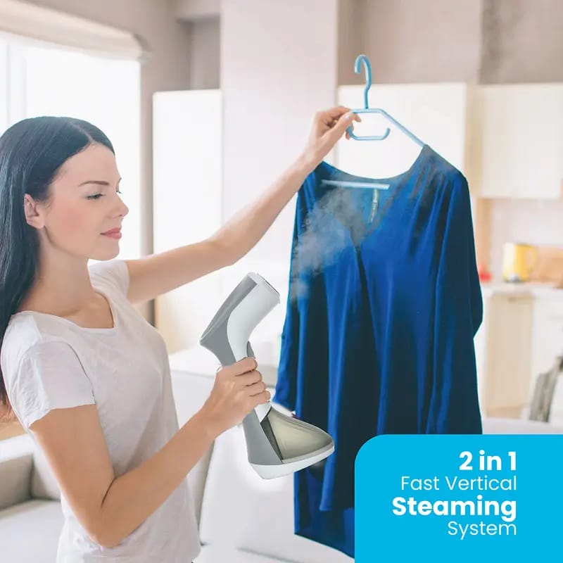 A Woman is Steaming Grament Using Pawa 2 in 1 Fast Vertical Steamer.