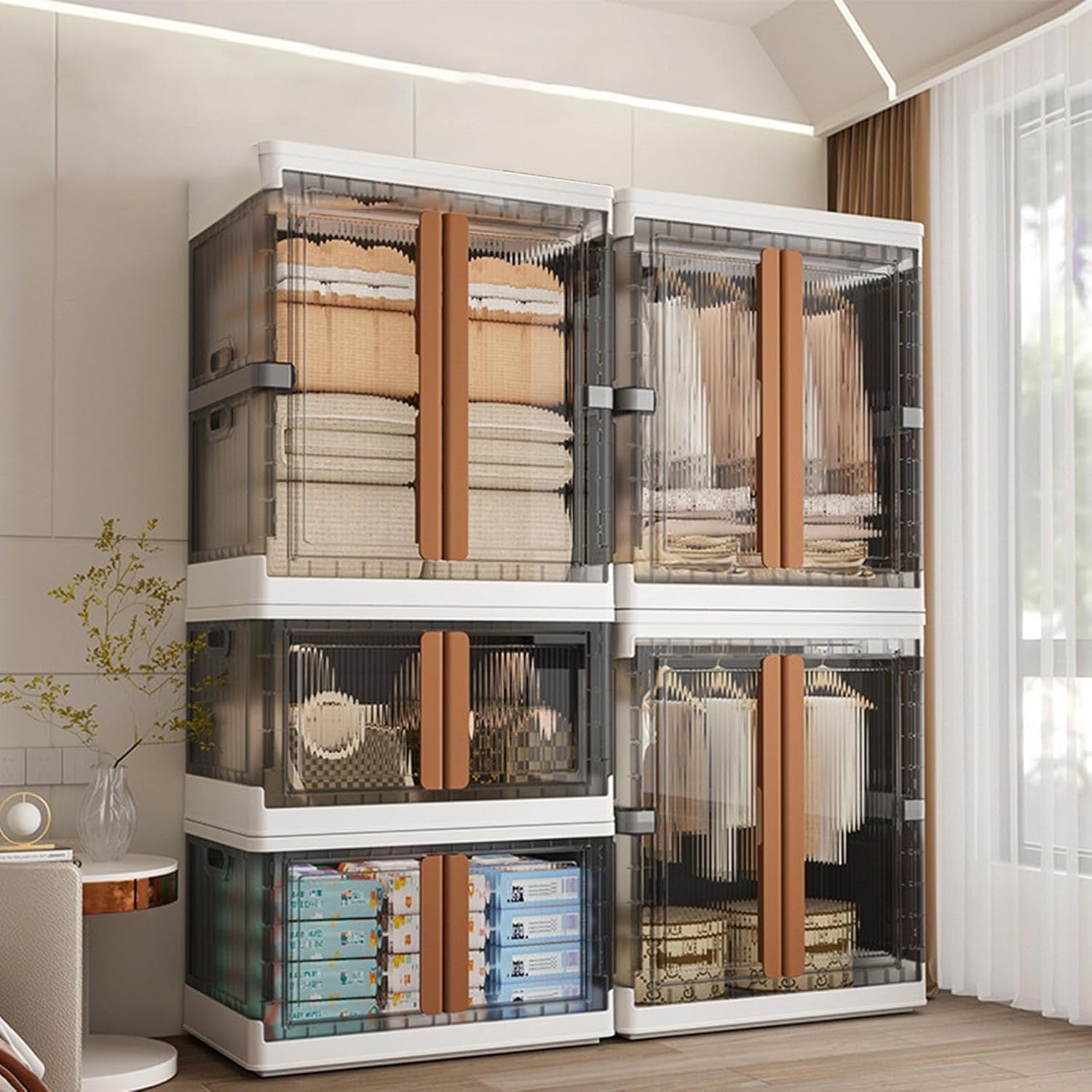 Clothes and Other Home Essentials are Organized in a Stackable Storage Bins.