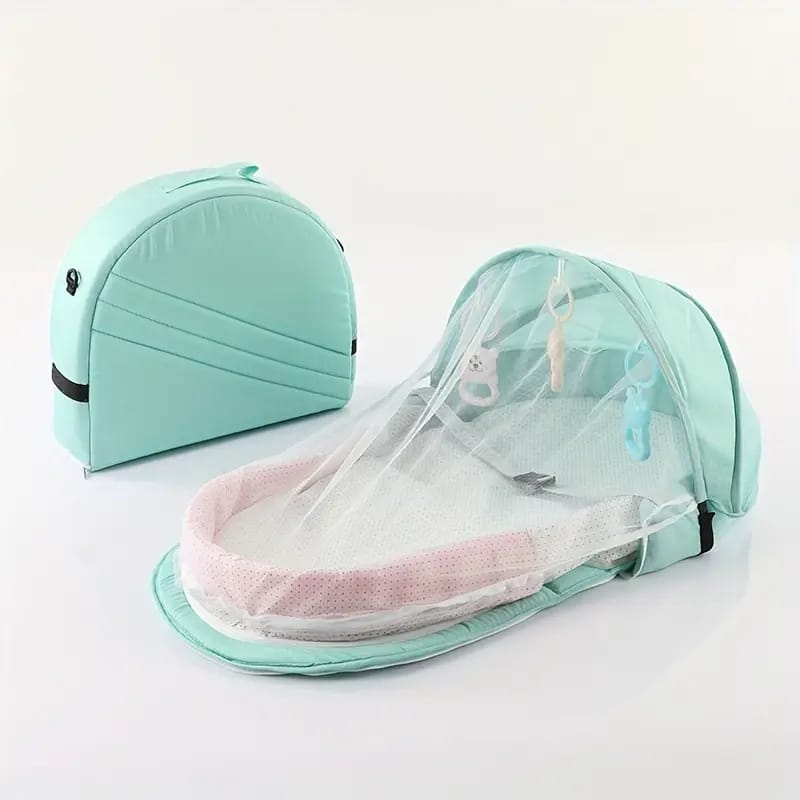 Portable Baby Bed in Green Color.