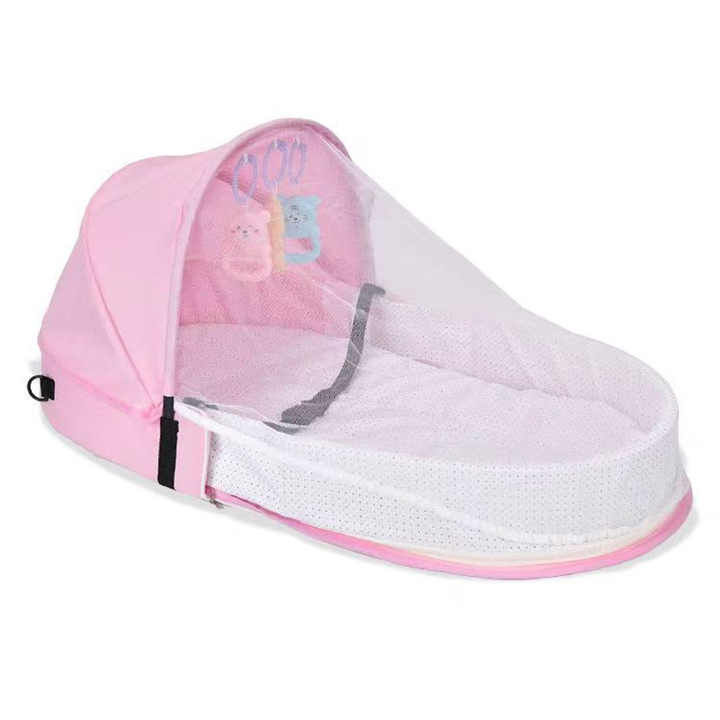 Portable Baby Bed in Pink Color.