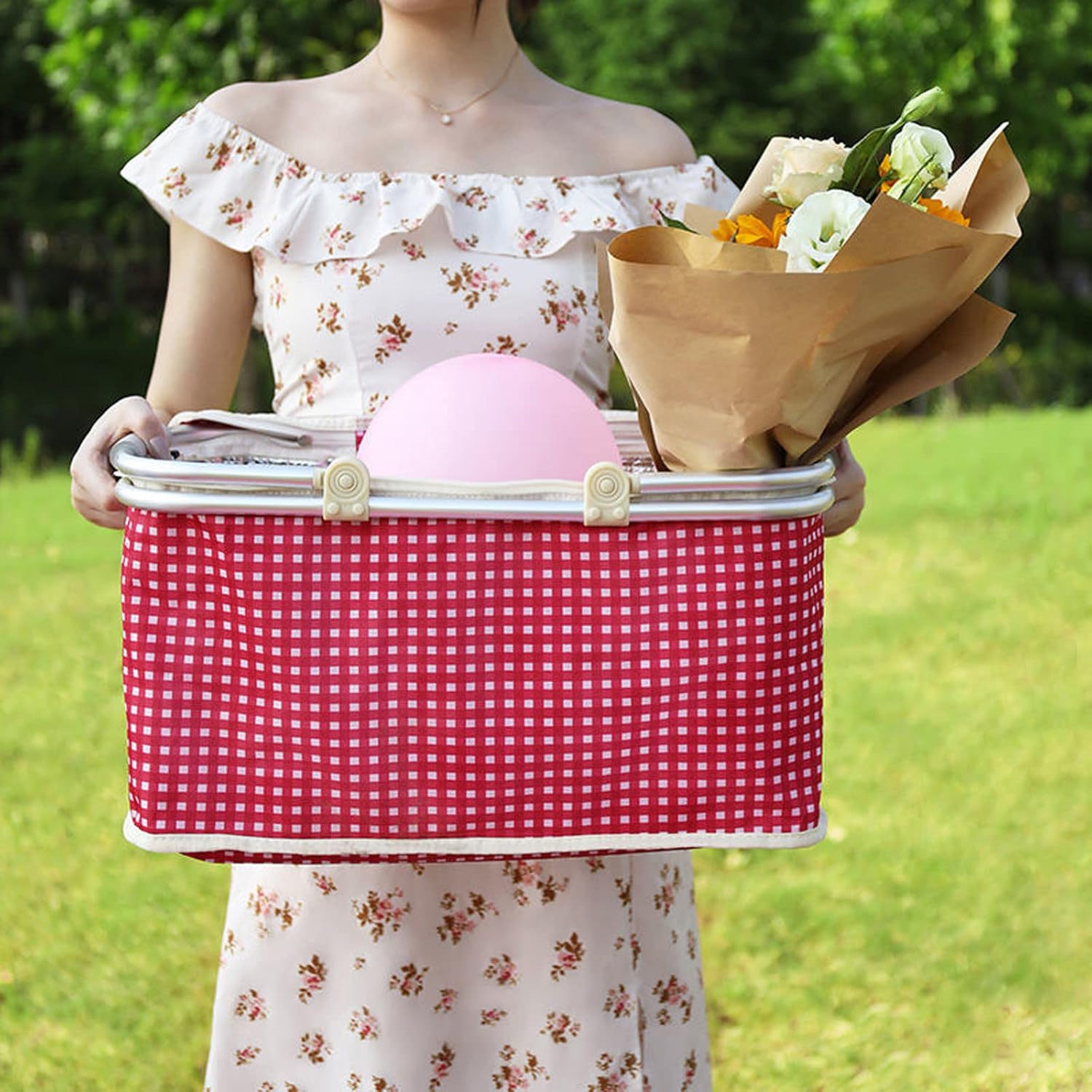 A Woman is Holding Portable Picnic Basket.