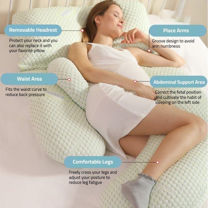 A Women is Lying On a Pregnancy Pillow.