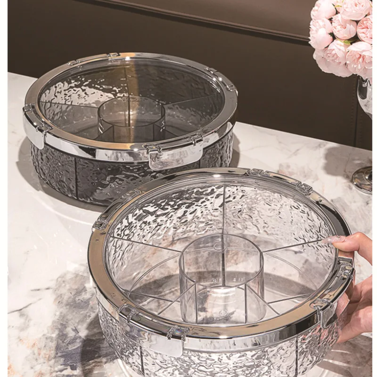 A Person is Holding Press-Down Vacuum Fruit Plate.