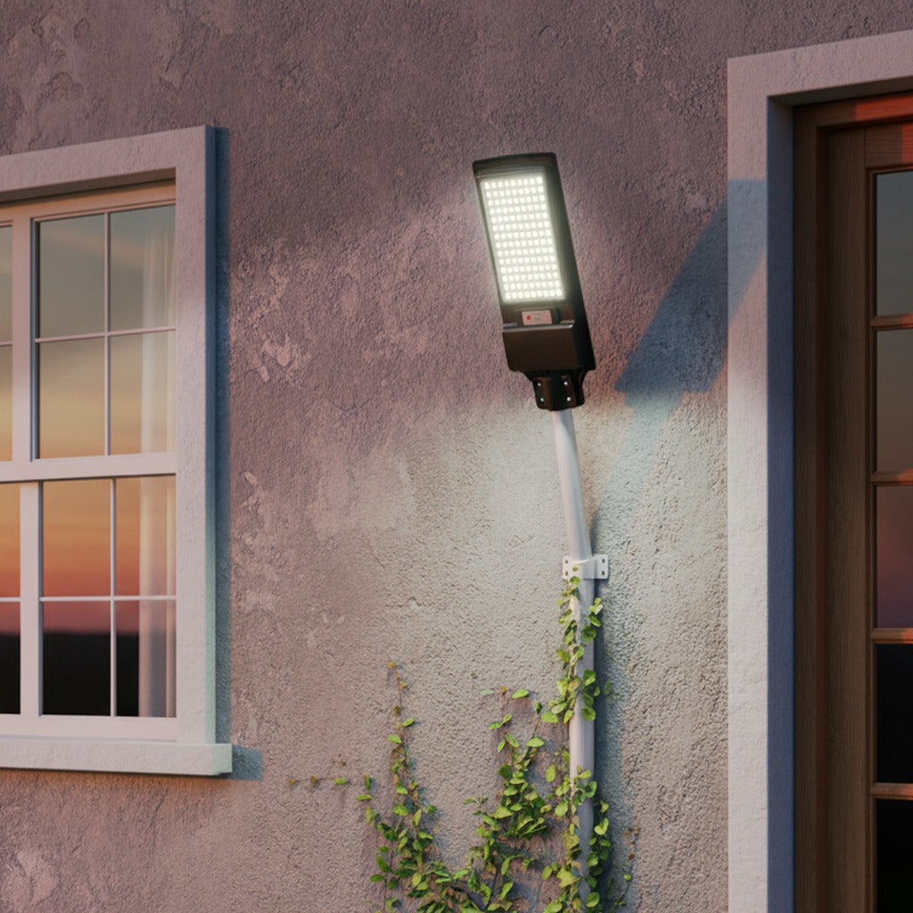 A Solar LED Street Light illuminates the side of a modern house