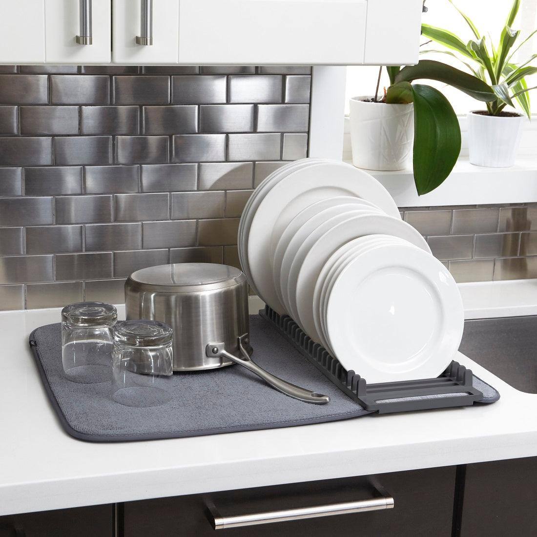 Plates are Organized in a Kitchen Dish Rack.