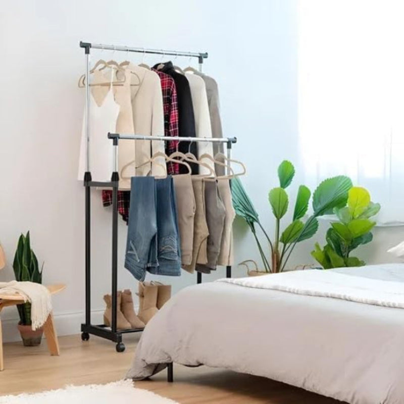 A Double Pole Portable Garment Rack is Organized with Clothes.
