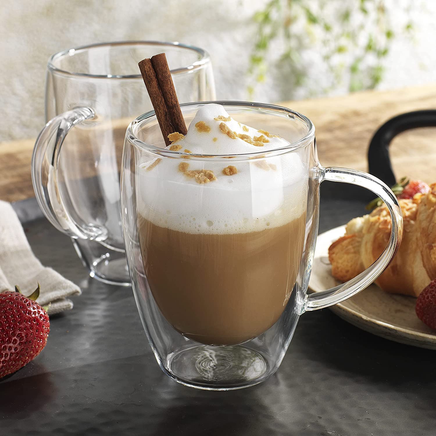 A Double Wall Glass Coffee Mug with Coffee.