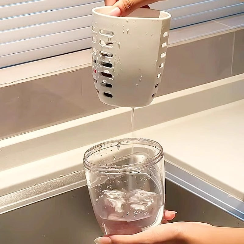 A Person is Draining Fruits Using Drainable Fruit Storage Cup.