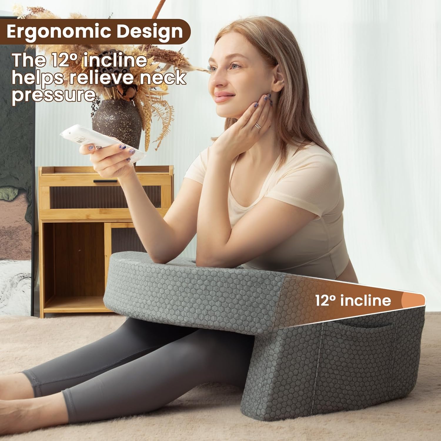 A Woman is Using Mobile Phone with the Support Of Bed Reading Pillow.