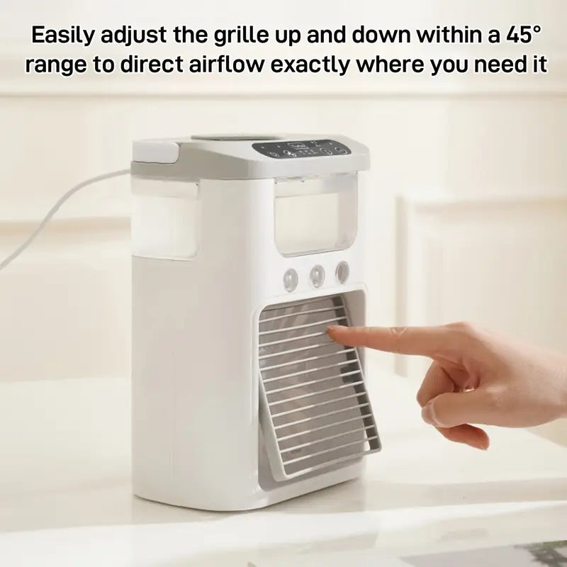 A Person is Adjusting the Grill Of Portable Air Cooler Fan.