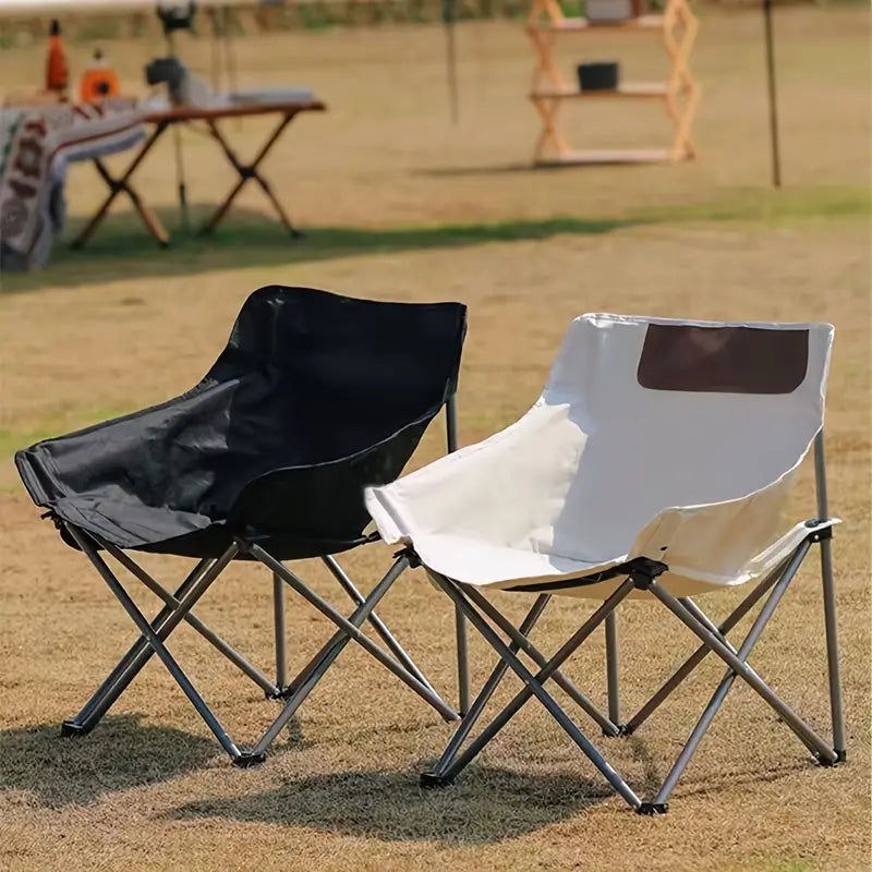 Portable Folding Camping Chairs are Arranged near Camping Area.