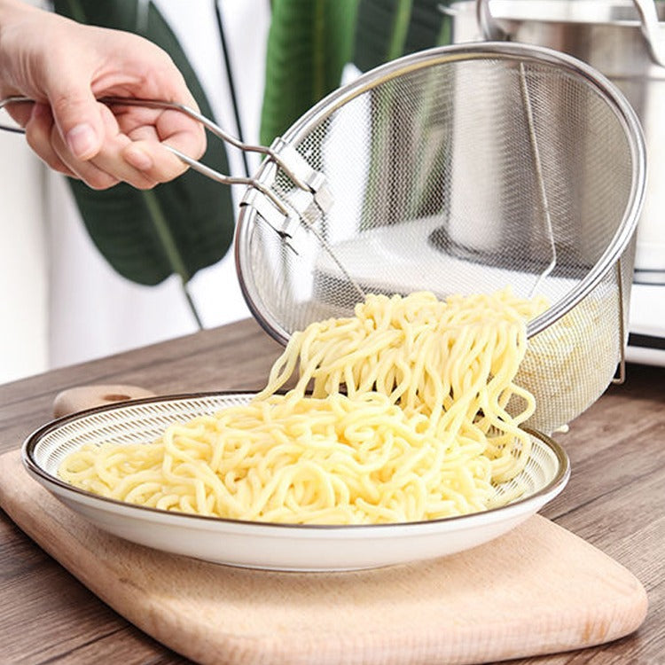 A person using a Deep strainer basket holding cooked noodles