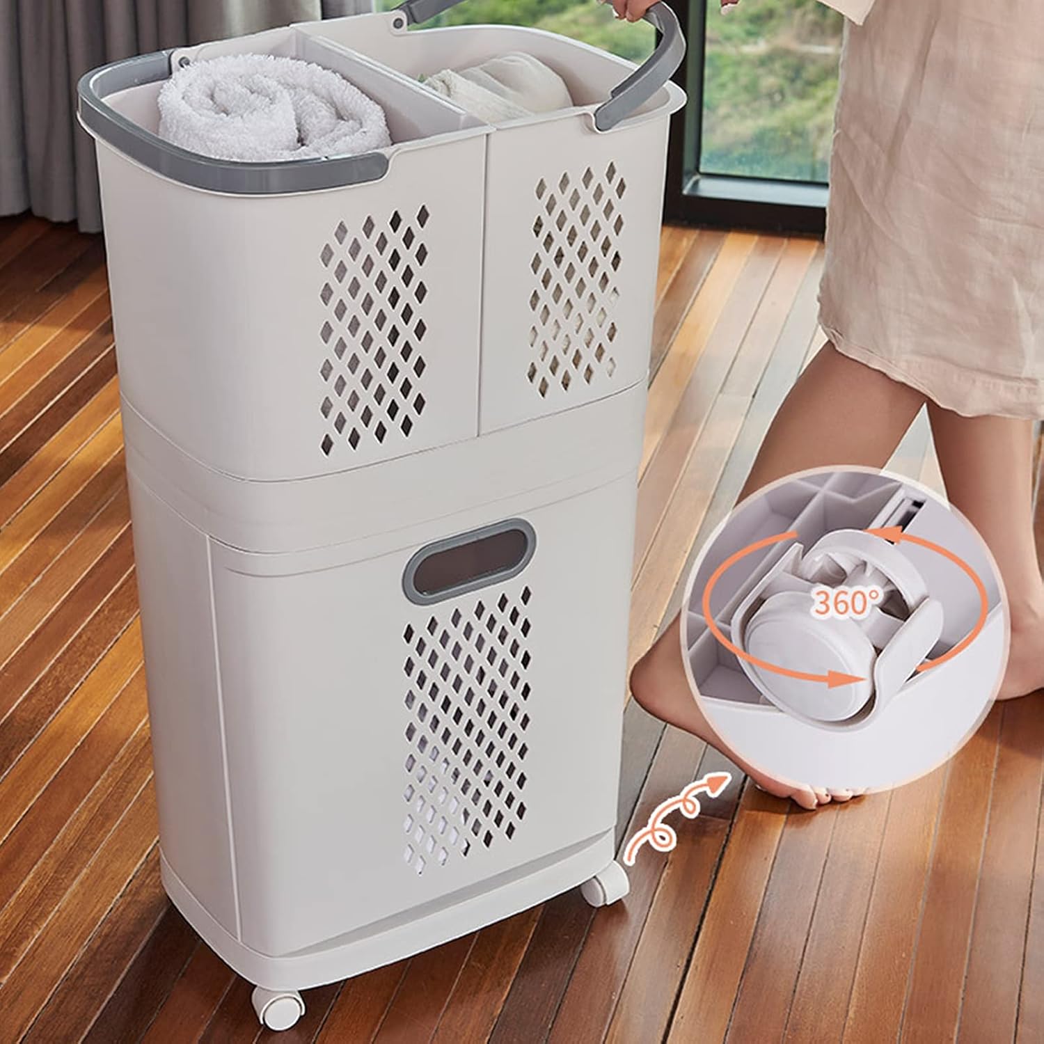 A person holds the 360° Rotating Wheels of laundry basket