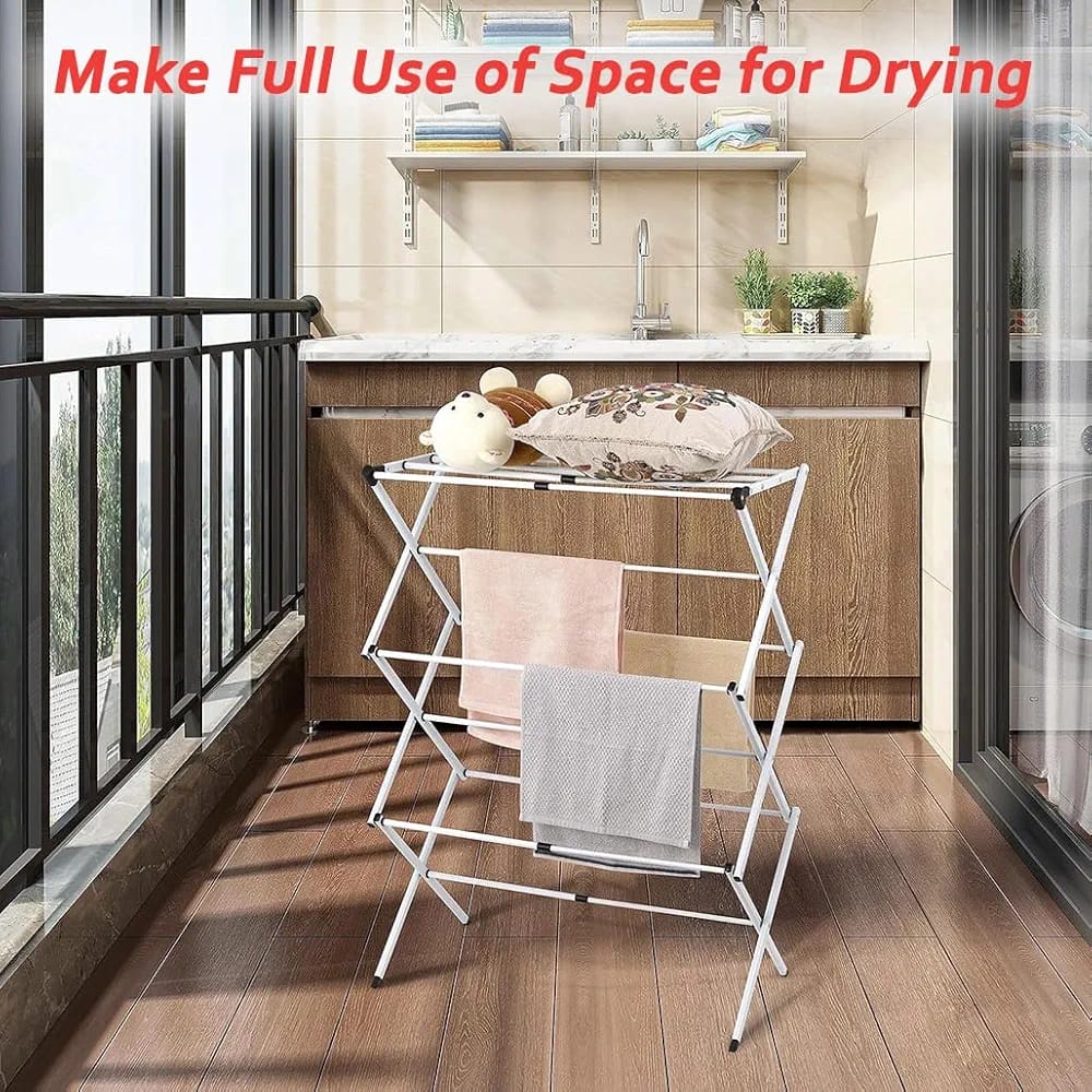 3-tier expandable clothes drying rack on a balcony, perfect for drying towels and clothes.