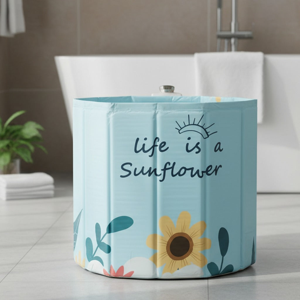 A light blue portable adult bathtub.