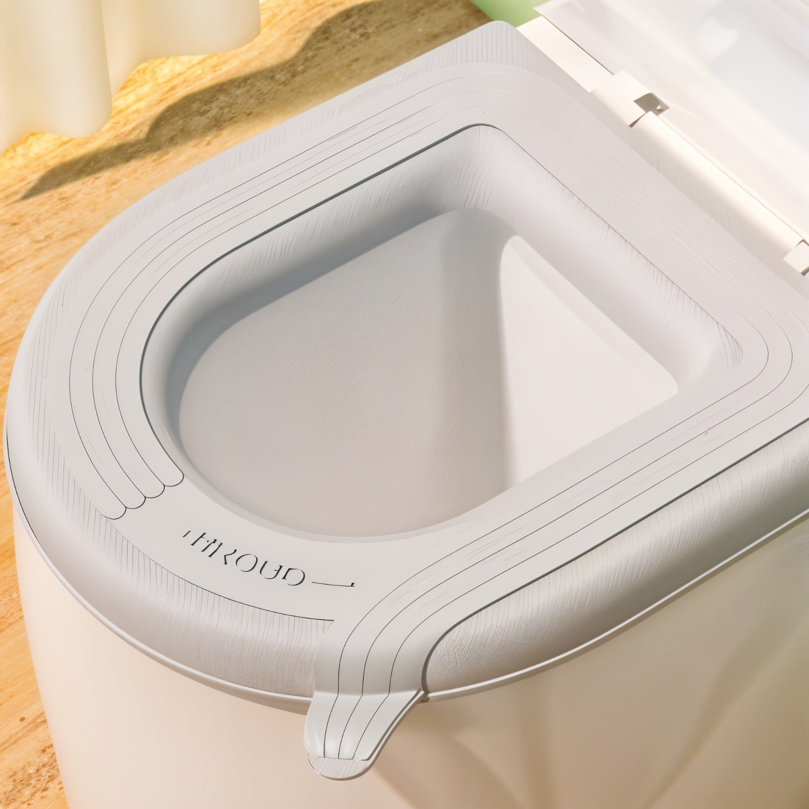 A padded toilet seat cover shown fitted on a toilet.