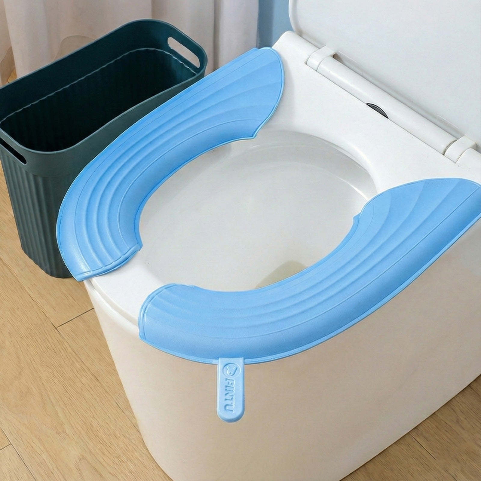 Soft waterproof Toilet Seat Cushion Cover, placed on a toilet seat for added comfort and hygiene.