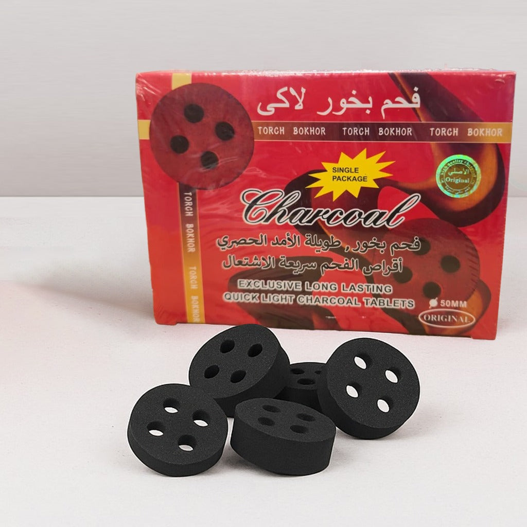 A Quick-Light Charcoal Tablets with its Box.
