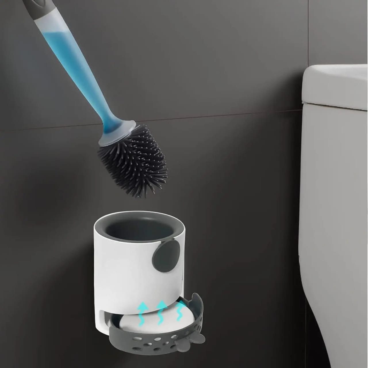 Refillable Toilet Cleaning Brush is Attached on the Wall Of Toilet.
