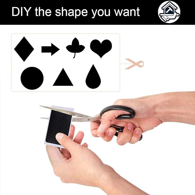 Someone cutting Reusable Black Chalkboard Labels Roll