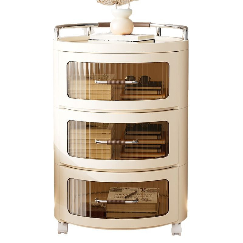 Round Rolling Storage Cabinet Organized with Books.