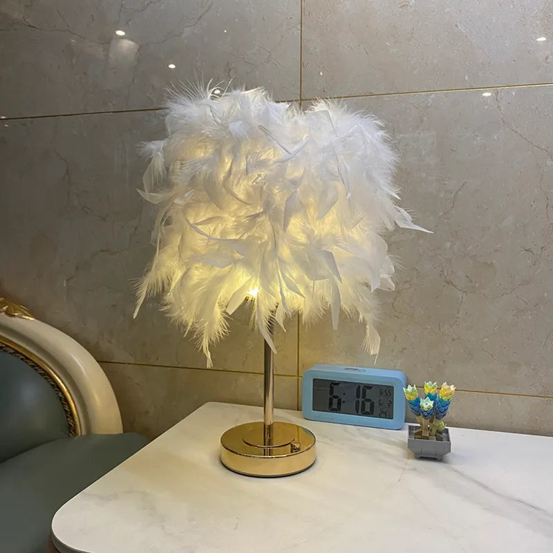 A Feather Shade Table Lamp is placed on the table next to the sofa